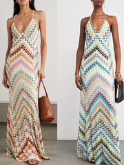 Chevron knit maxi dress with crisscross straps and a colorful zigzag pattern.