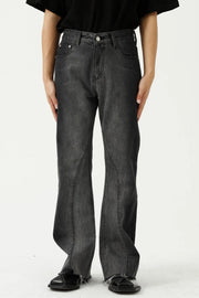Dark wash cotton flare jeans with seam detail and raw hem