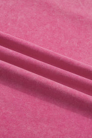 Pink mineral wash t-shirt with subtle texture and soft cotton fabric.