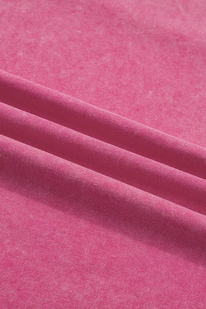Pink mineral wash t-shirt with subtle texture and soft cotton fabric.