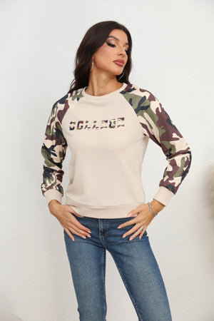 Cream crewneck sweatshirt with camouflage raglan sleeves and "COLLEGE" graphic.