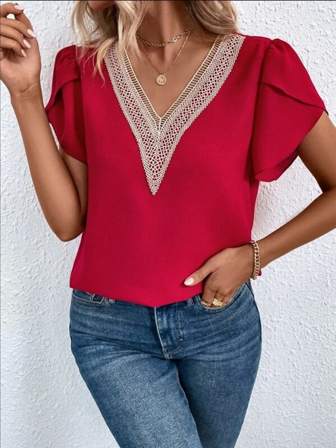 Red lace trim v-neck flutter sleeve blouse with gold trim detail