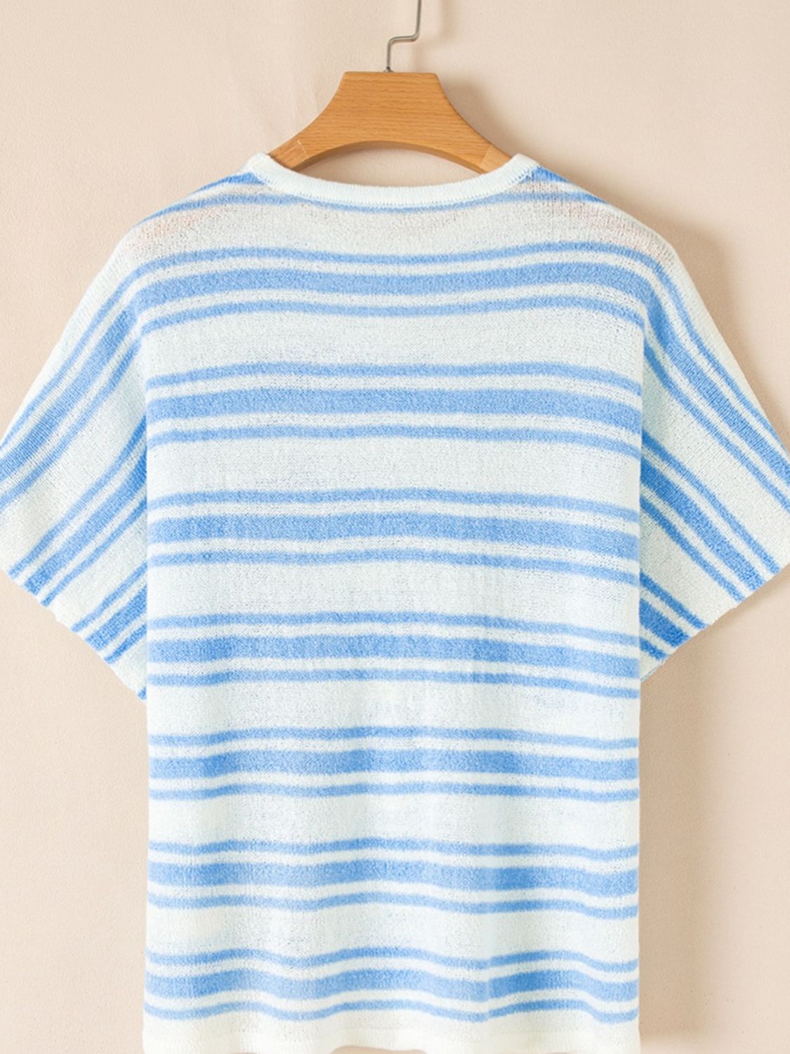 Boxy stripe knit t-shirt in light blue and white acrylic with short sleeves and crew neck.