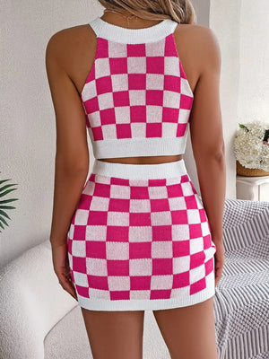 Hot Pink checkerboard knit halter crop top and mini skirt set with white trim.