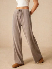 Gray ribbed wide-leg drawstring pants with a relaxed fit.