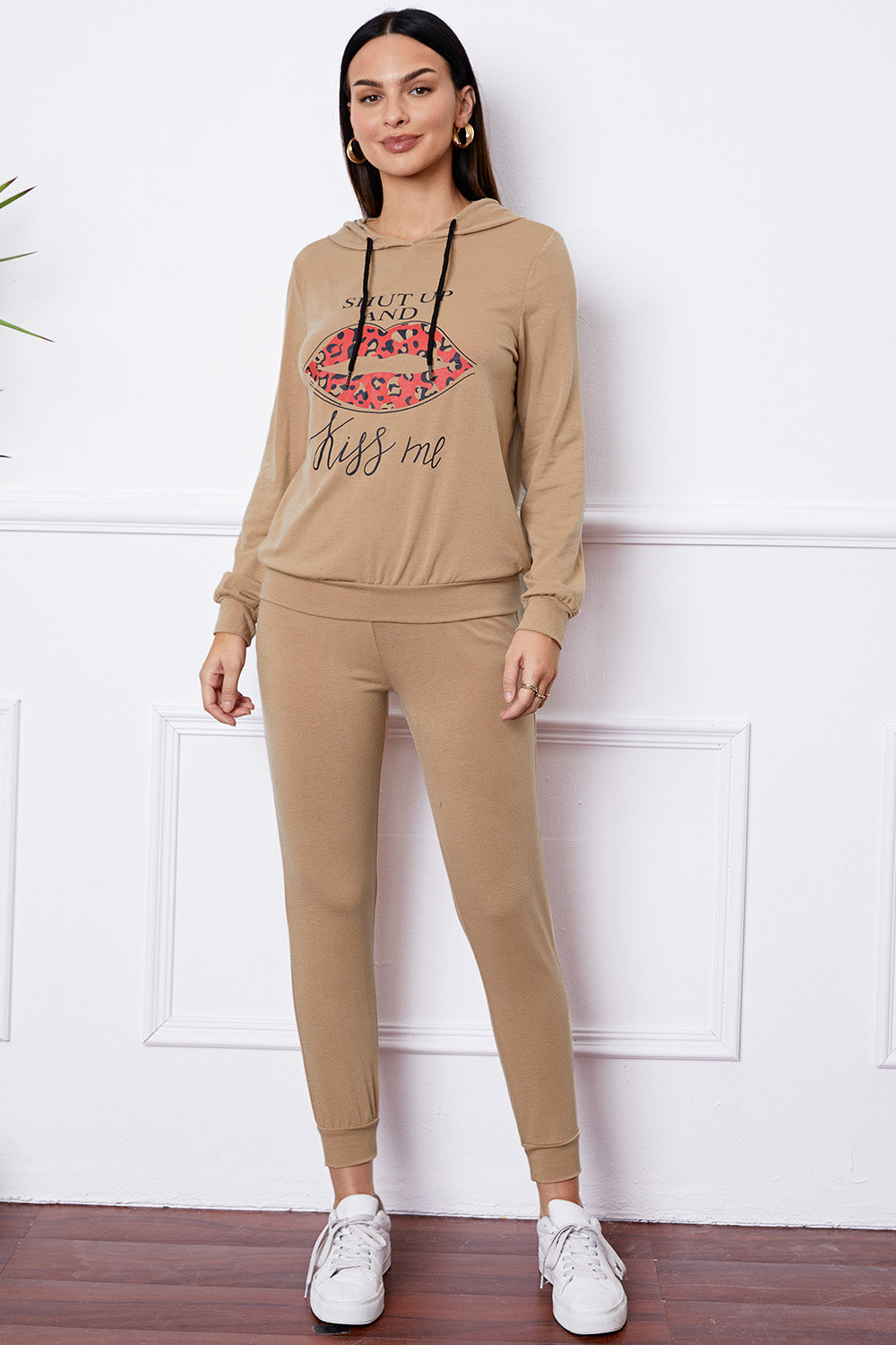 Khaki loungewear set with "Shut Up And Kiss Me" lip graphic hoodie and joggers.