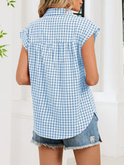 Sky blue gingham cotton shirt with cap sleeves and button-down front, shown from the back.