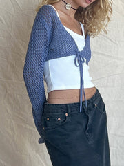 Dusty blue crochet tie-front bolero shrug with open knit and long sleeves.