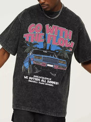 Vintage graphic oversized men's tee in black with "Go With The Flow" text and car graphic.