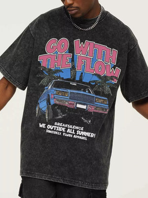 Vintage graphic oversized men's tee in black with "Go With The Flow" text and car graphic.