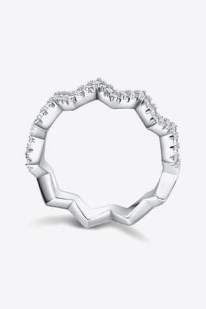 Silver zigzag pavé moissanite band ring with a geometric design.