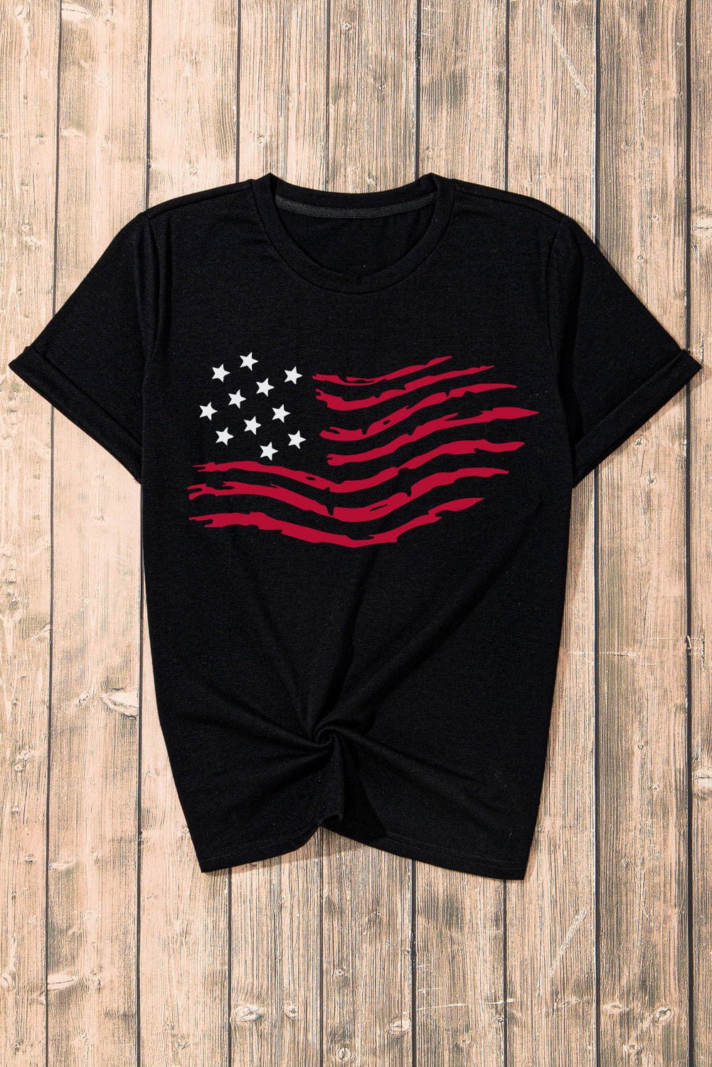 Black t-shirt with distressed American flag graphic and white stars.