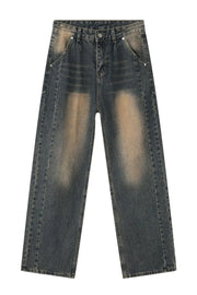 Baggy dark wash denim jeans with faded detailing and a relaxed fit.