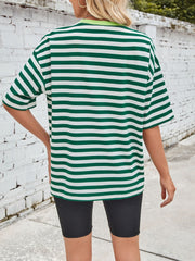 Relaxed fit t-shirt with green and white stripes and a contrast neon green neckline.
