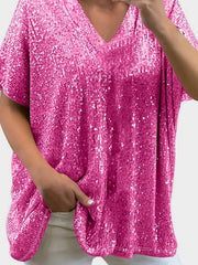 Pink sequin slouchy V-neck blouse with short sleeves and a relaxed fit.