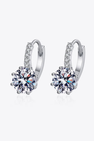 Sterling silver hoop earrings with moissanite halo and large center stone.
