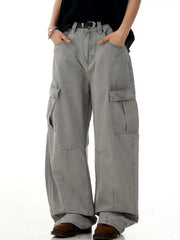 Men's grey vintage wide-leg cargo pants with multiple pockets and a relaxed fit.