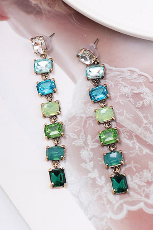 Ombre Gemstone Cascade Earrings with multicolor faceted stones and gold alloy setting.