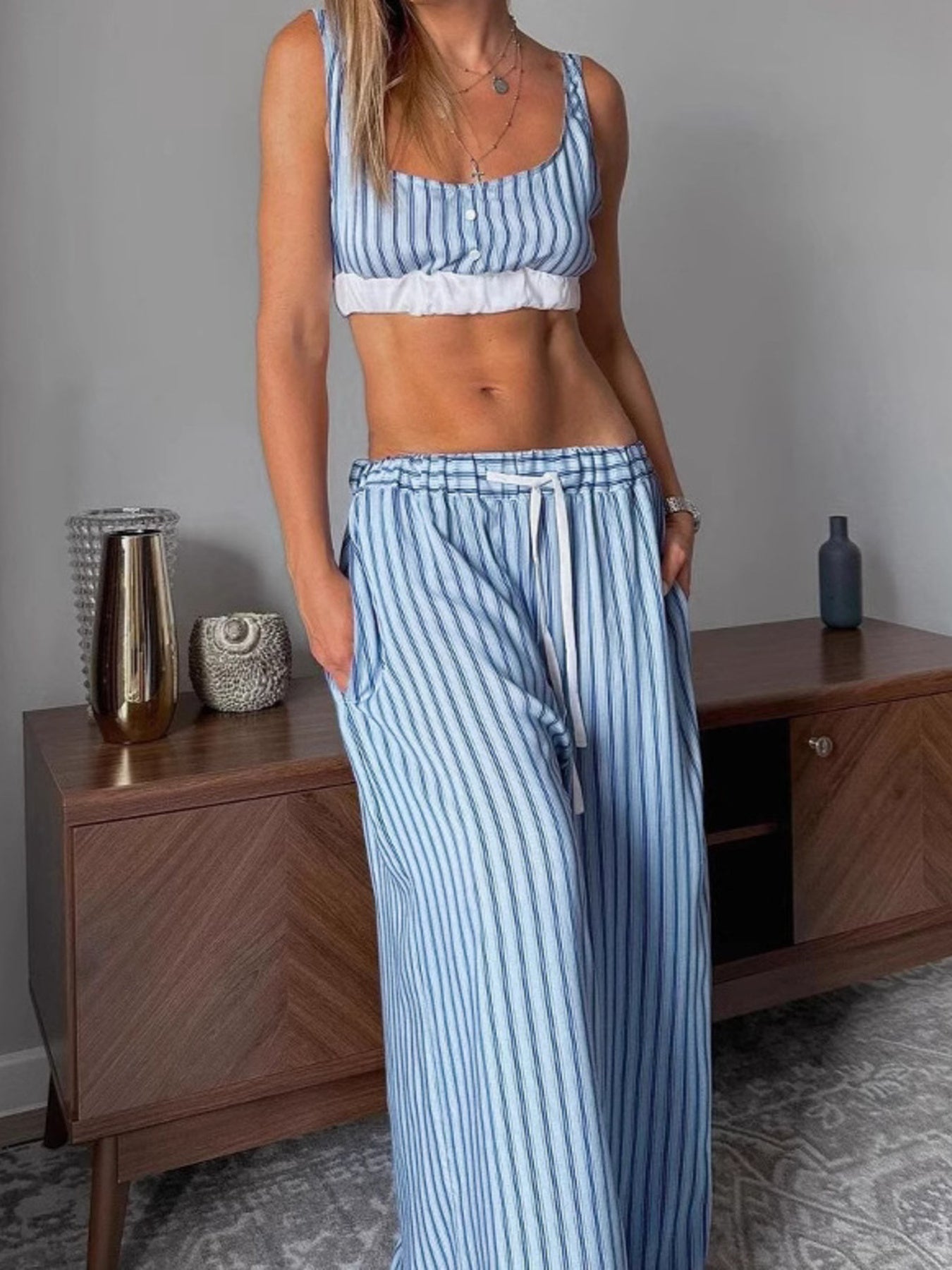 Blue striped pajama set with button-up cami and drawstring pants
