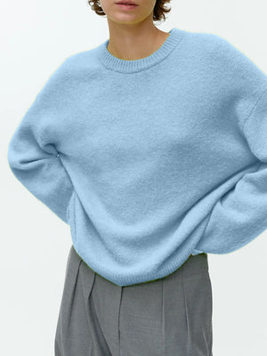 Light blue oversized brushed knit crewneck sweater with a soft texture.