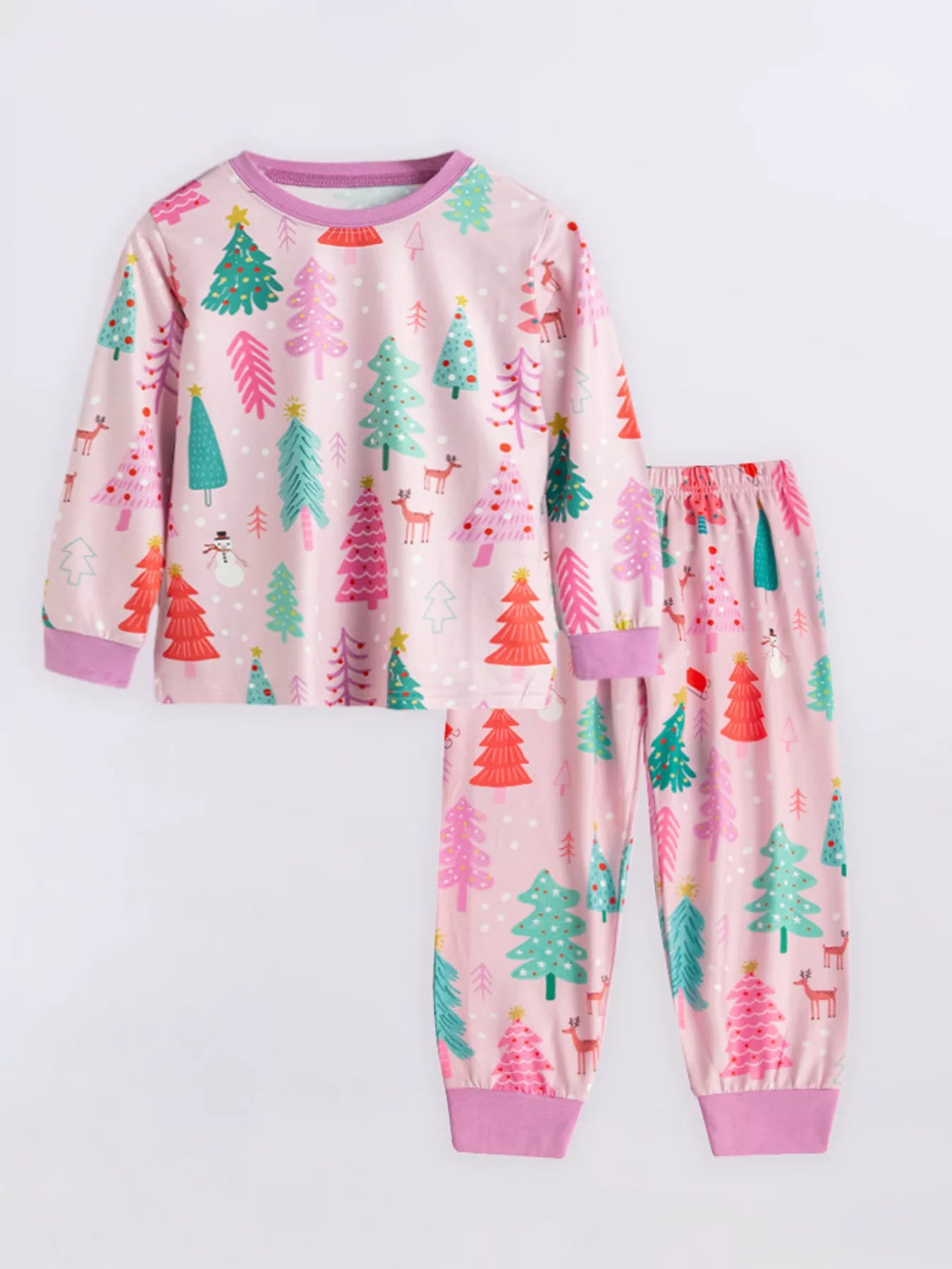 Baby pajama set in light yellow with Christmas trees, snowmen, and deer print. Long sleeves, crew neck, elastic waist pants.