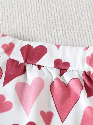 Baby shorts with pink and red heart print, elastic waist