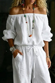 White off-shoulder two-piece set with drawstring waist and puff sleeves