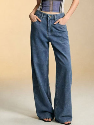 Maternity wide-leg jeans in blue cotton blend with a high waist and pockets.