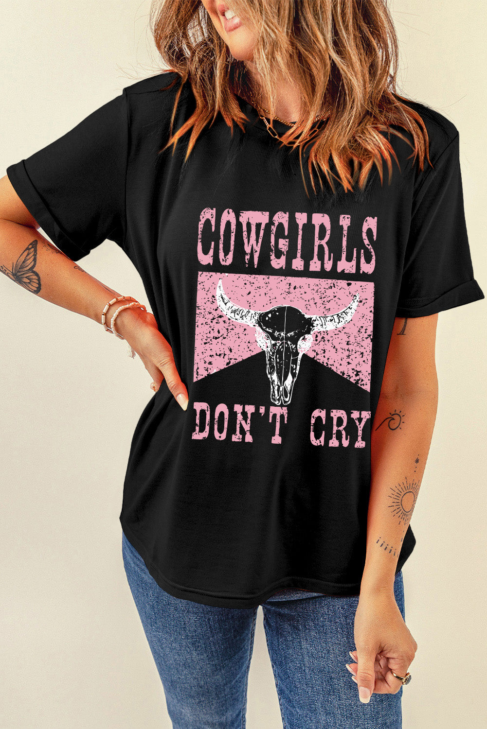 Black graphic tee with distressed cowgirl skull and text print