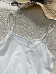 White cami top with scoop neck and thin straps