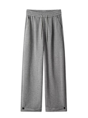Relaxed fit grey herringbone sweatpants for men with drawstring and ankle cuffs.