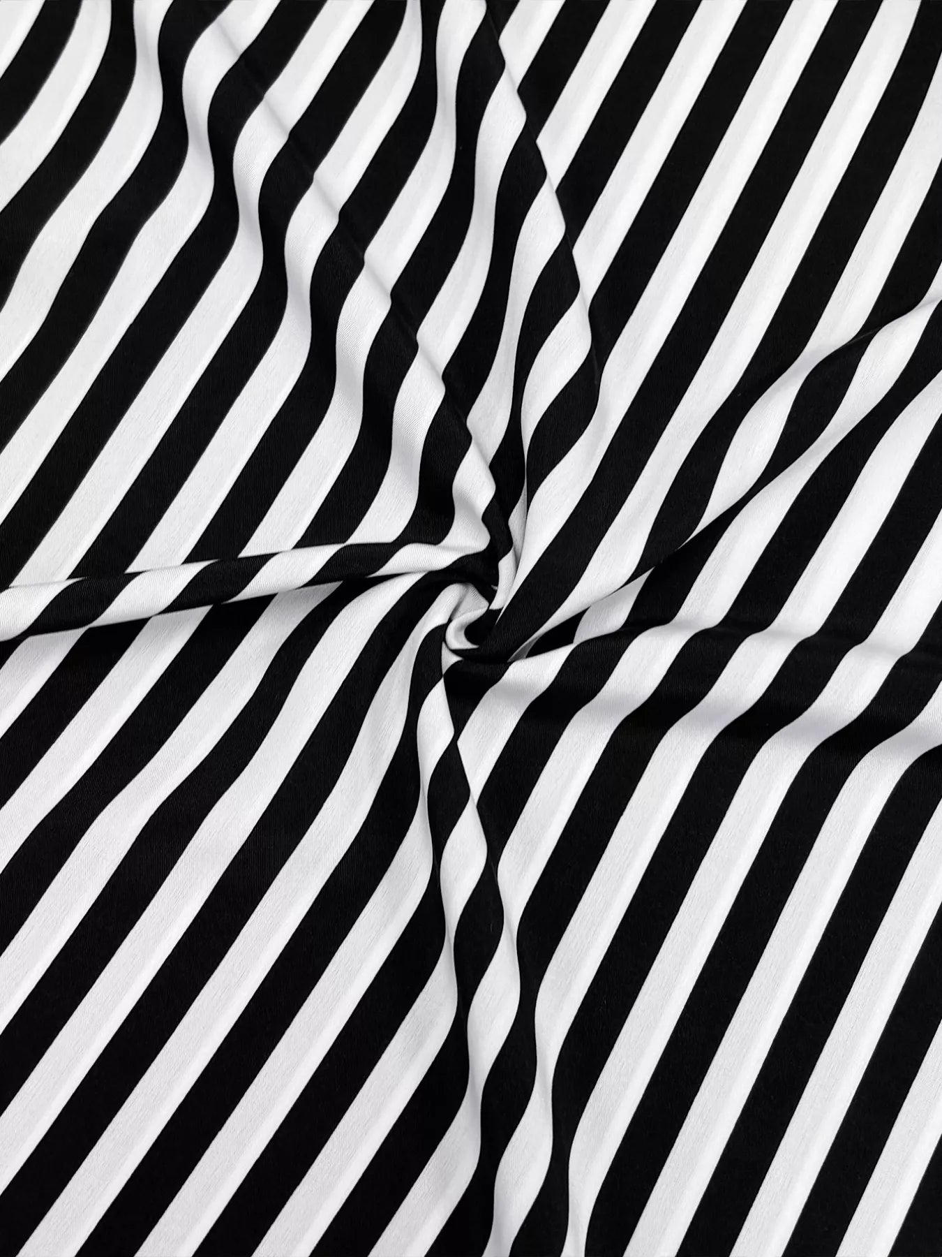 Notched midi dress in black and white stripe fabric with long sleeves.