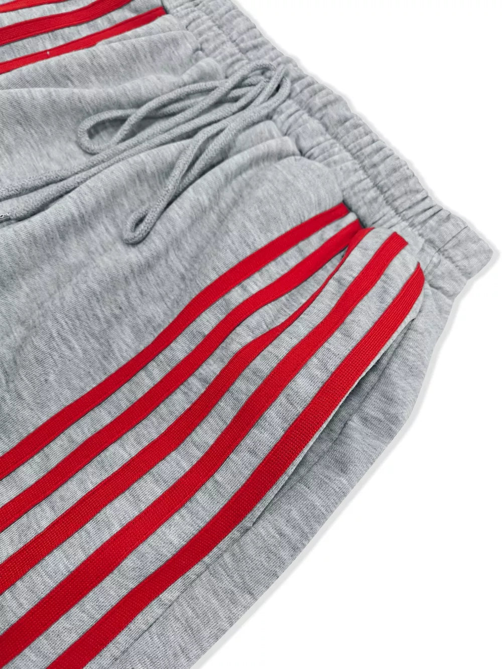 Grey lounge shorts with red side stripes and drawstring waist.