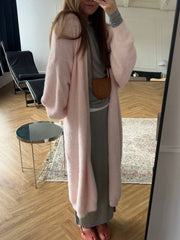 Plush pink maxi cardigan with balloon sleeves and open front, acrylic material.