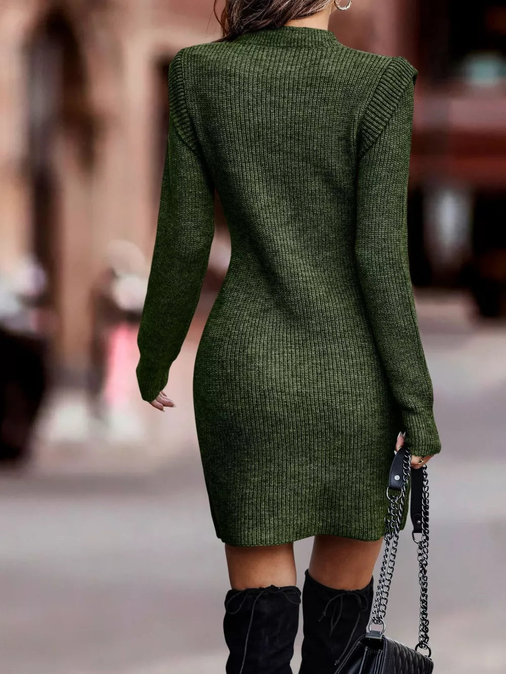 Dark green ribbed bodycon sweater dress with long sleeves and a mock neck.