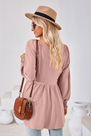 Textured babydoll blouse in Dusty Pink with smocked cuffs and square neckline.