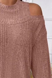 Ribbed mock neck cold shoulder top in dusty pink with a textured knit.