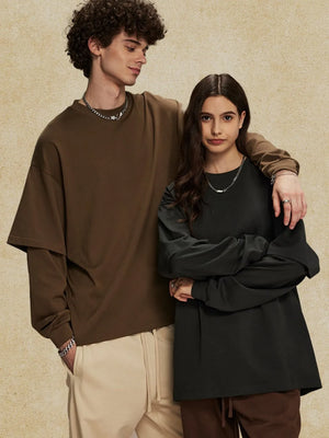 Layered sleeve oversized tee in brown and dark gray, crewneck, casual long sleeve style.