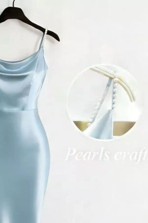 Light blue satin cowl neck maxi dress with pearl-embellished straps.