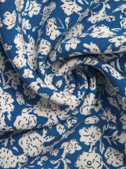 Light blue mini skirt with a ditsy floral print and ruffle detail.