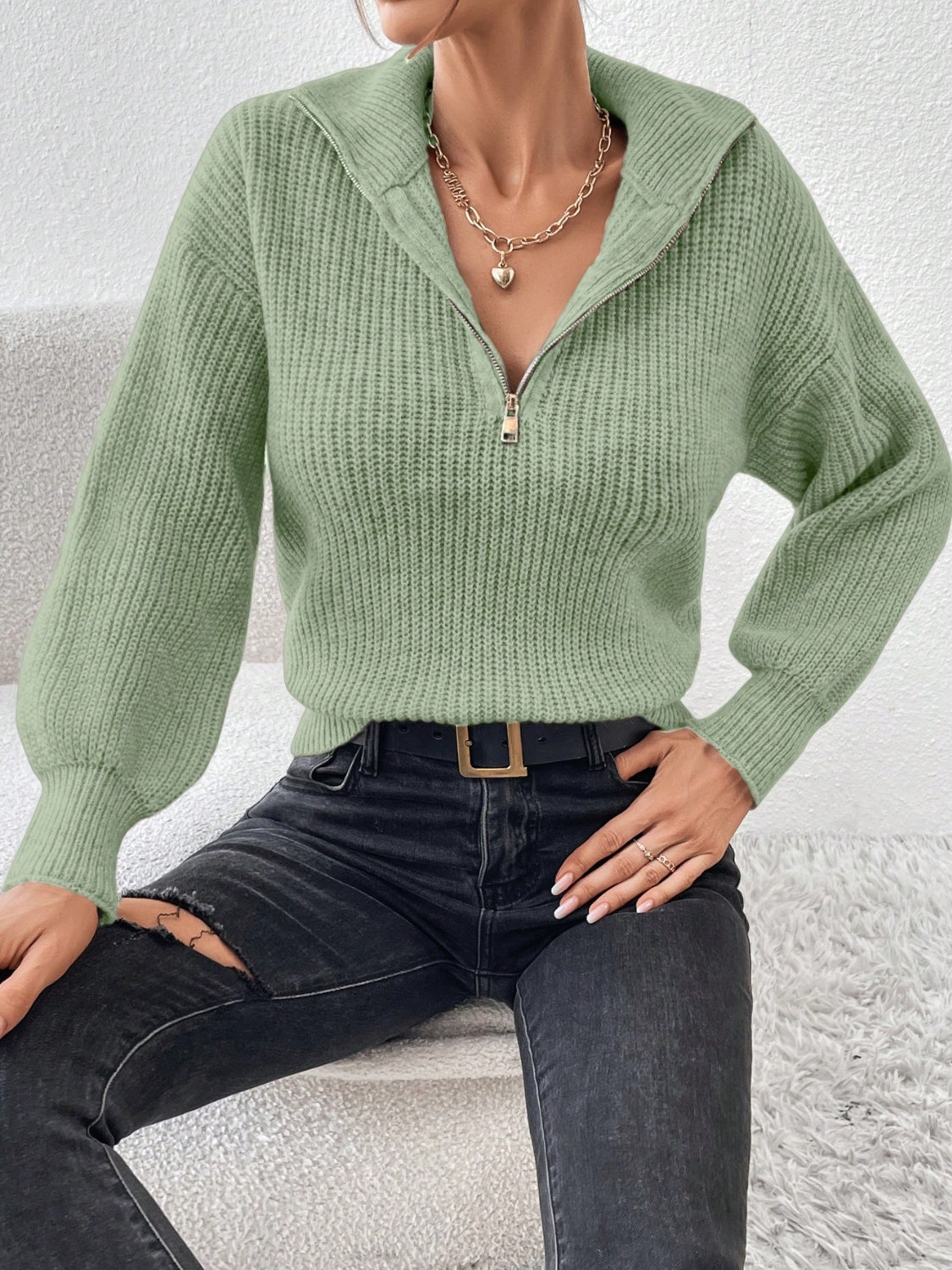 Matcha green ribbed collar zip-up knit sweater with balloon sleeves.