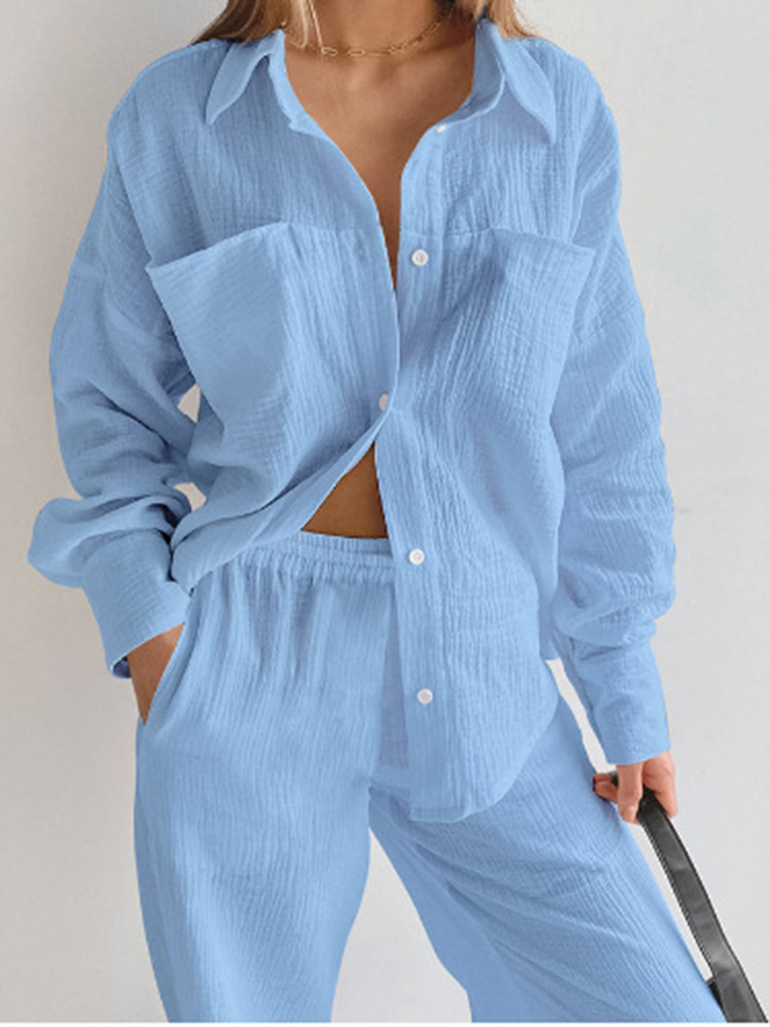 Light blue textured cotton lounge set with button-down shirt and pants.