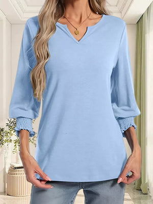 Sky blue maternity t-shirt with notched neckline and ruched 3/4 sleeves.