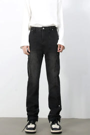 Dark wash denim trousers with asymmetric seams and button details