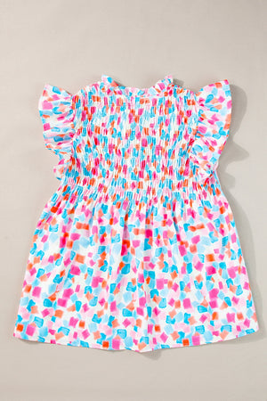 Smocked bodice blouse with brushstroke print in teal, sherbet, and pastel blue.