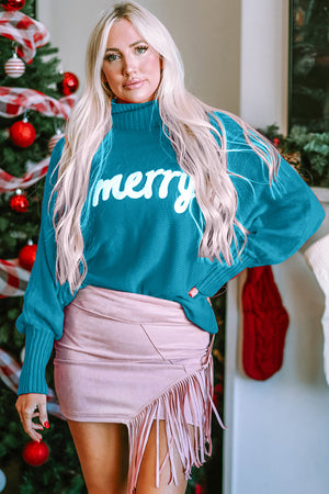Teal acrylic turtleneck sweater with white "merry" graphic and dolman sleeves.