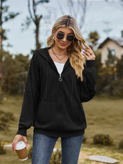 Black textured knit dolman sleeve zip-up hoodie with pockets and drawstring hood.