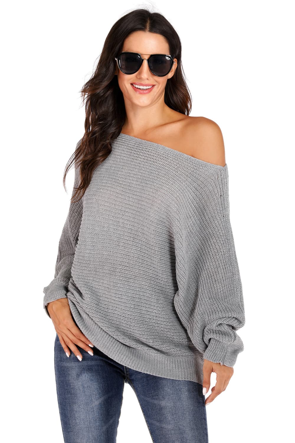 Light gray off-shoulder batwing knit sweater with relaxed fit and long sleeves.