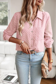 Textured chevron button-down blouse in blush pink with a collared neckline and button front.