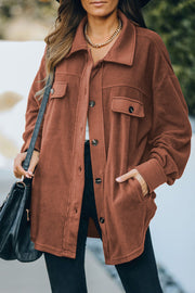 Fleece shirt jacket in Caramel with patch pockets and button front.